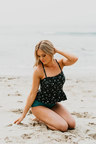 PEPLUM TANKINI SWIM SUIT IN BLACK ITSY DAISY