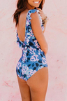 THE RUFFLE SCOOP ONE PIECE IN BLUE PAINTED FLORAL
