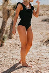THE RUFFLE SCOOP ONE PIECE IN BLACK